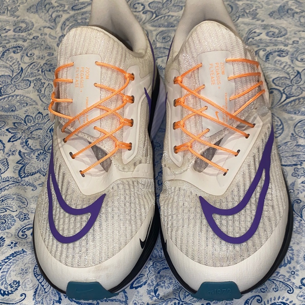 Nike White Running Shoes with Purple Swoosh & Orange Laces